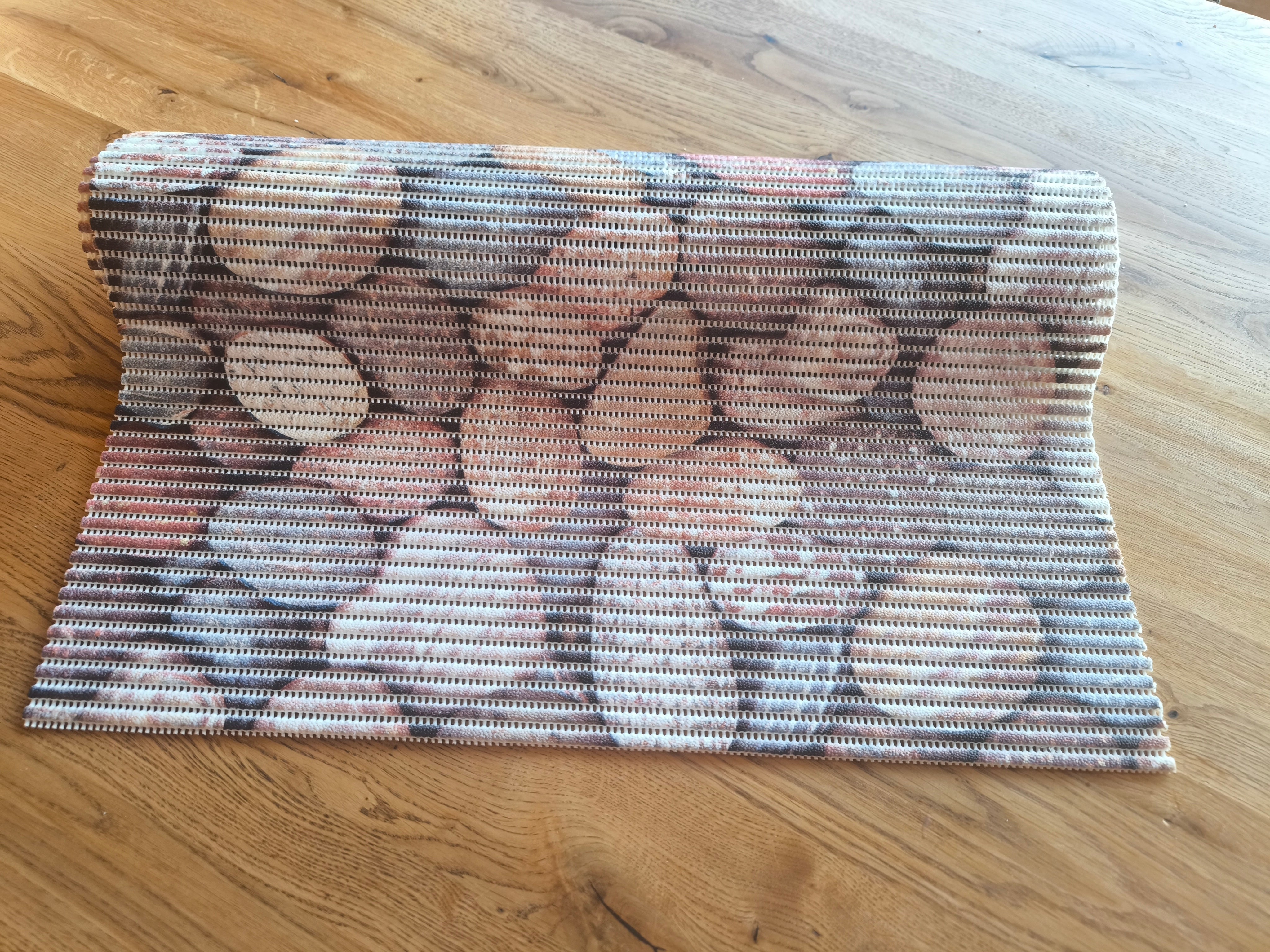 Fürdőszobai habosított pvc szőnyeg, színes kavics mintás, 65 cm széles